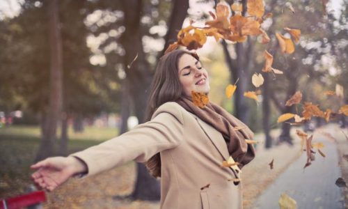 woman with leaves