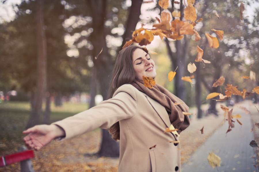 woman with leaves